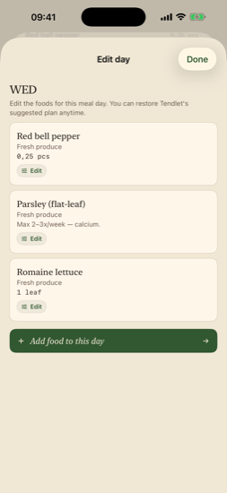 Editing one day's meals with per-food feeding-frequency cautions